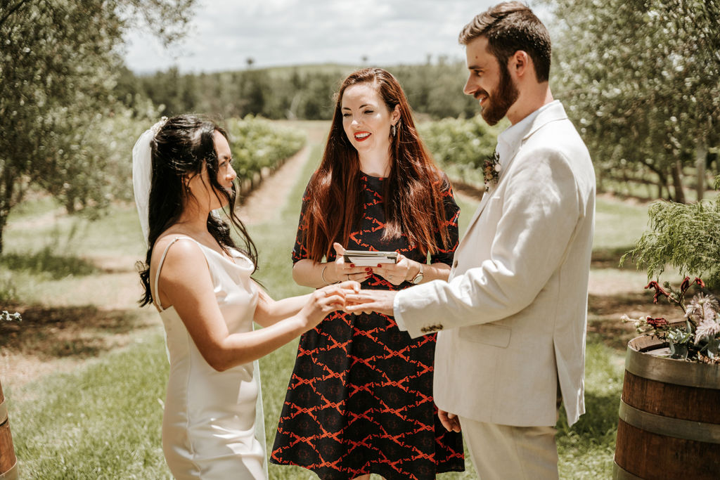 Celebrant Julie Muir talks to couple mid ceremony during Whispering Brook Elopement