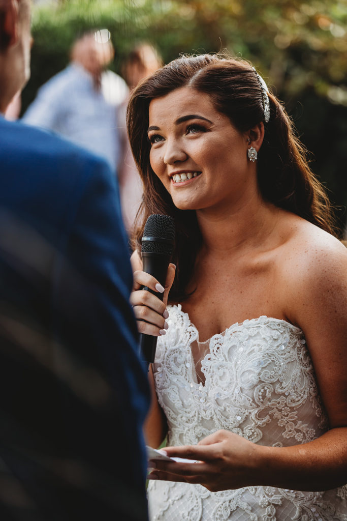 what getting married feels like: Bride looks lovingly at partner during vows