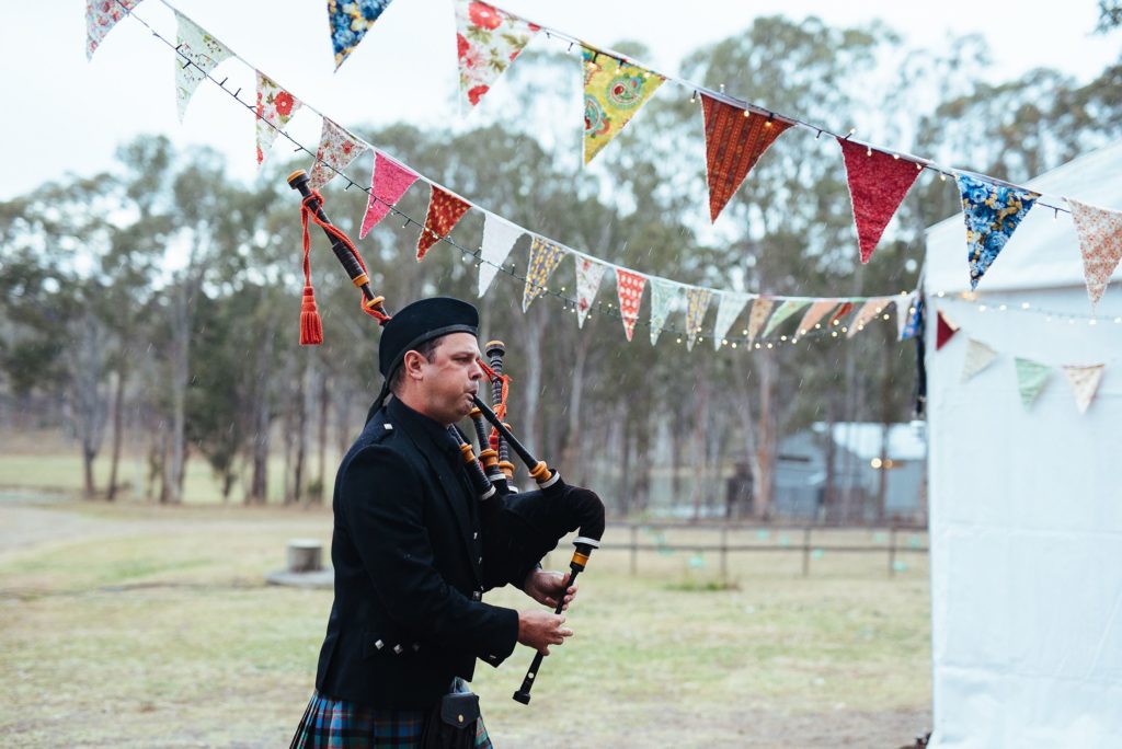 Bag piper playing music at Block Eight Winery wedding