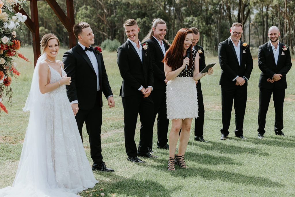 Hunter Valley Wedding Venue Bimbadgen Palmers Lane Celebrant Julie Muir making groomsmen laugh 