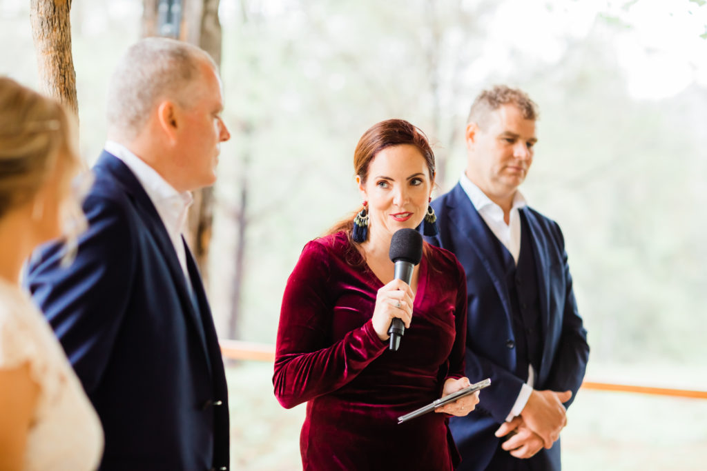 Celebrant Julie Muir mid-talking at a Stonehurst Cedar Creek wedding ceremony