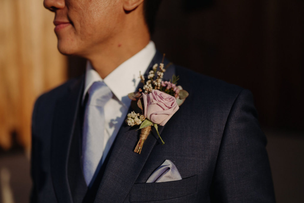 Close up of groom's Boutonniere at The Woodhouse Wollombi wedding