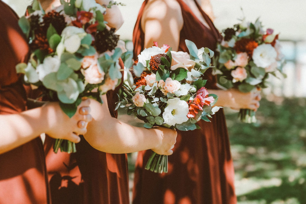 Bridesmaids holding their bouquets
