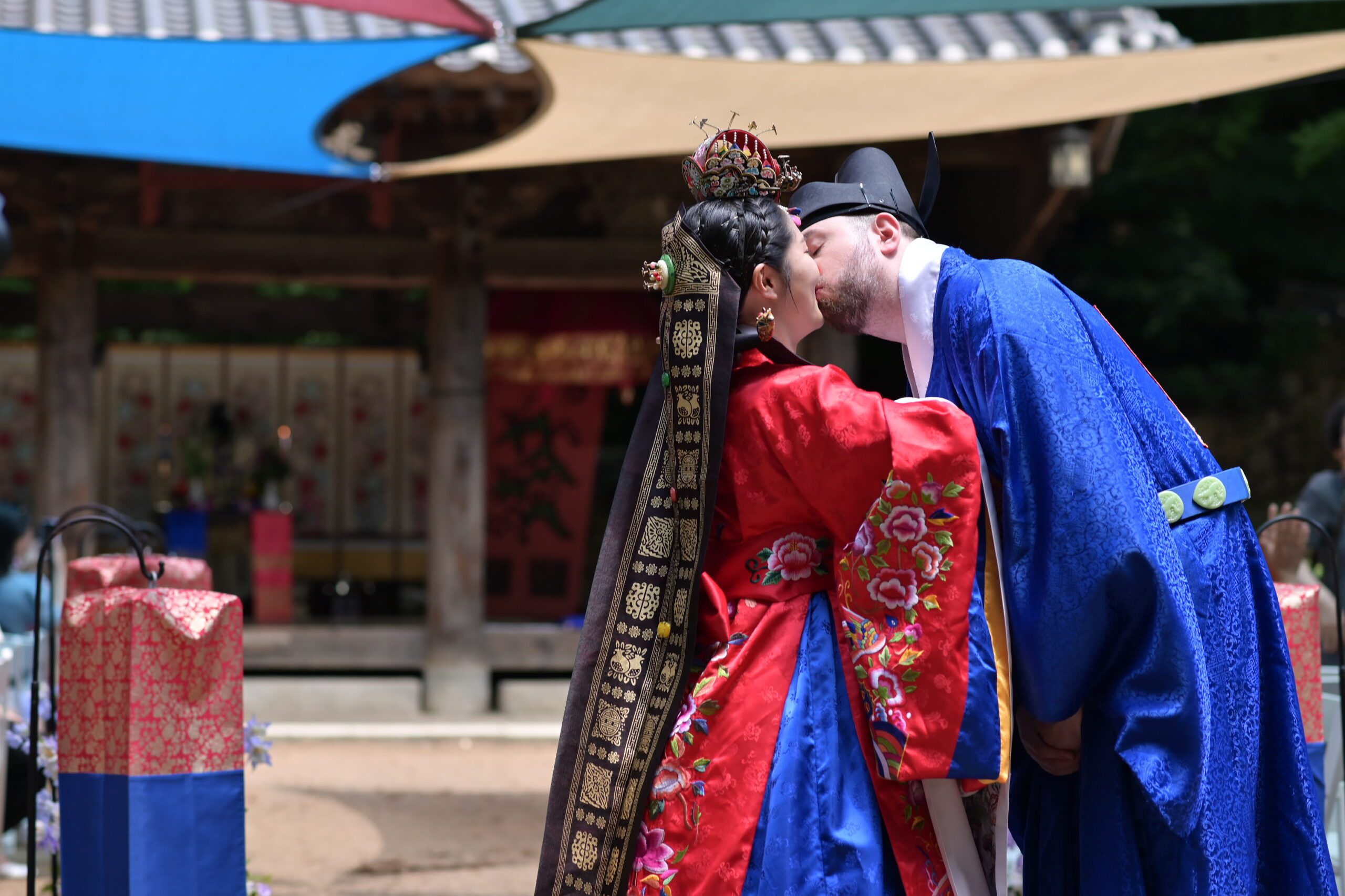 Couple kissing at Traditional Korean Wedding