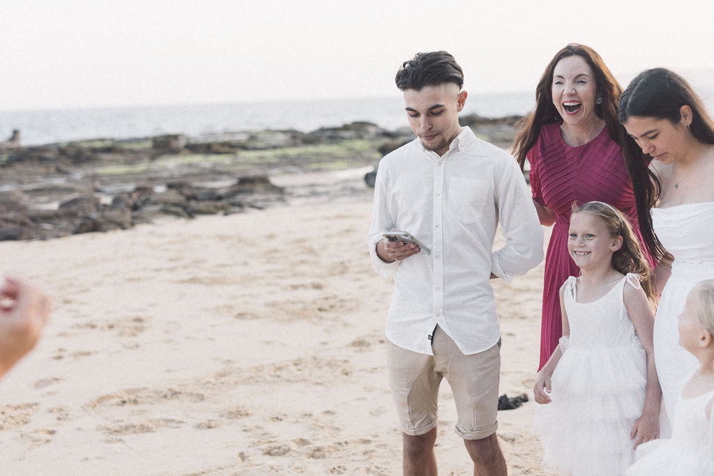 Celebrant Julie Muir standing with the children of the couple getting married Bar Beach Elopement