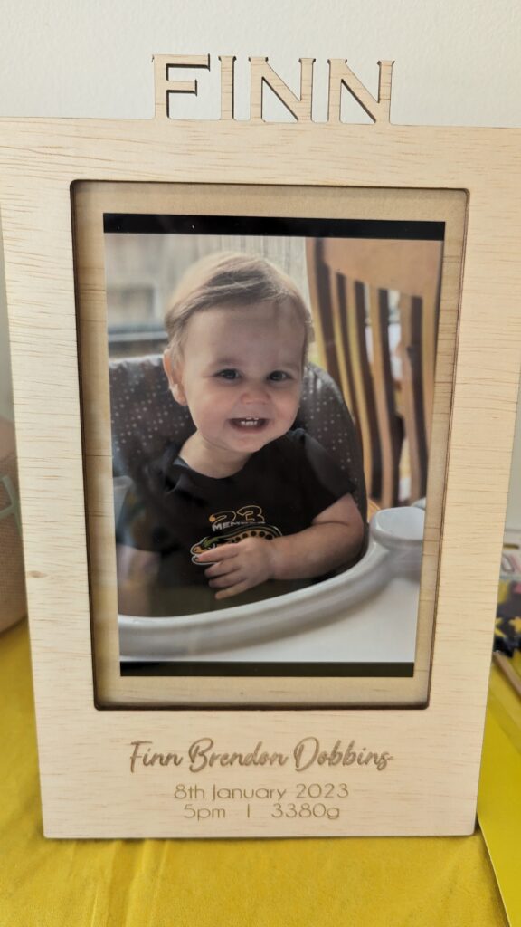 Framed photo of baby Finn smiling