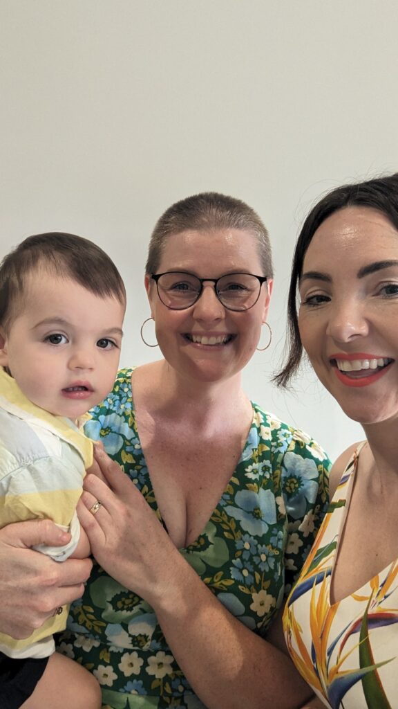 Celebrant Julie Muir with baby Finn and his mother