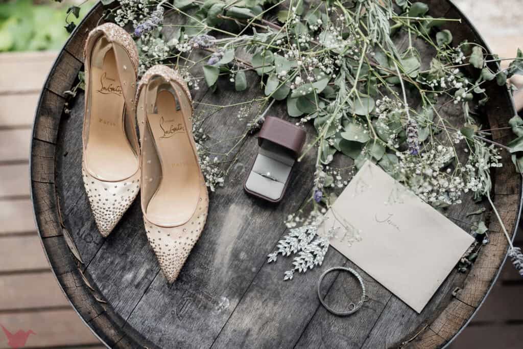 Flat lay of bride's shoes and jewellery at Anambah House