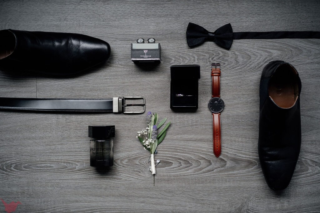 Flat lay of groom's accessories at Anambah House