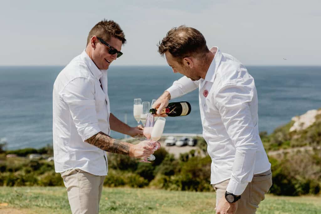 Pouring champagne at  Newcastle coastal wedding