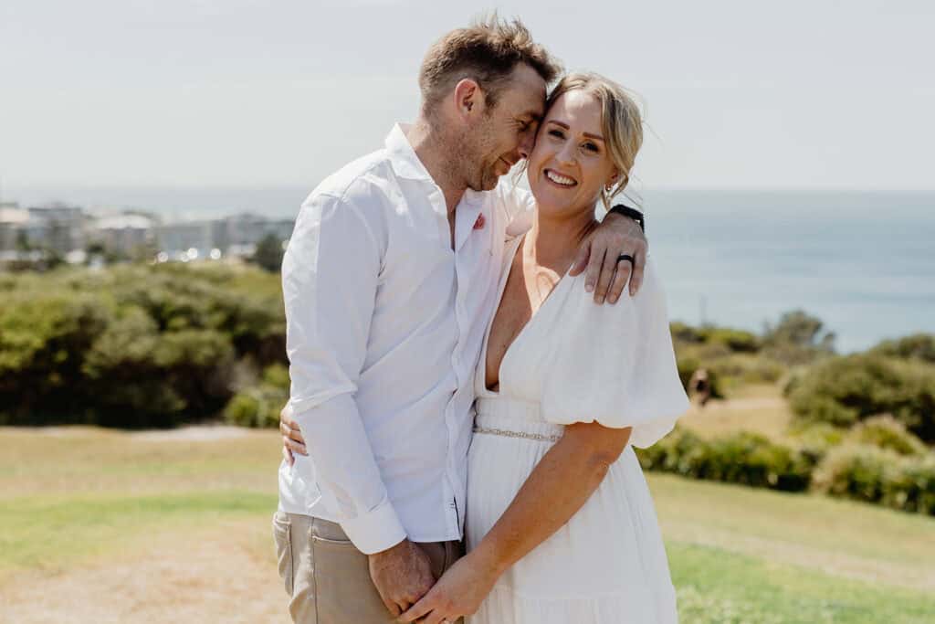 Beautiful wedding couple smiling for  Newcastle coastal wedding at Shepherds Hill