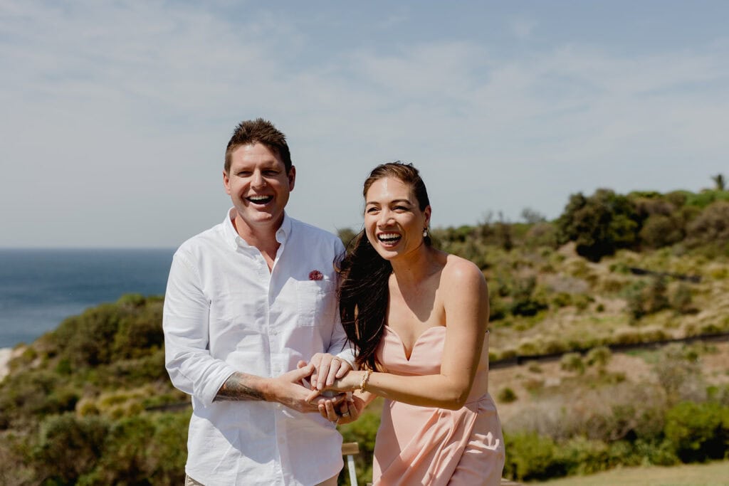 Friends perform ring warming at  Newcastle coastal wedding