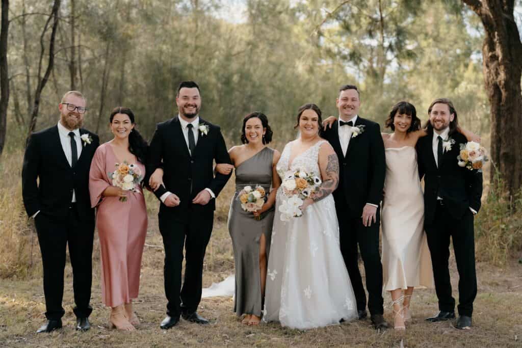 Wedding couple standing with another couple at The Wine House