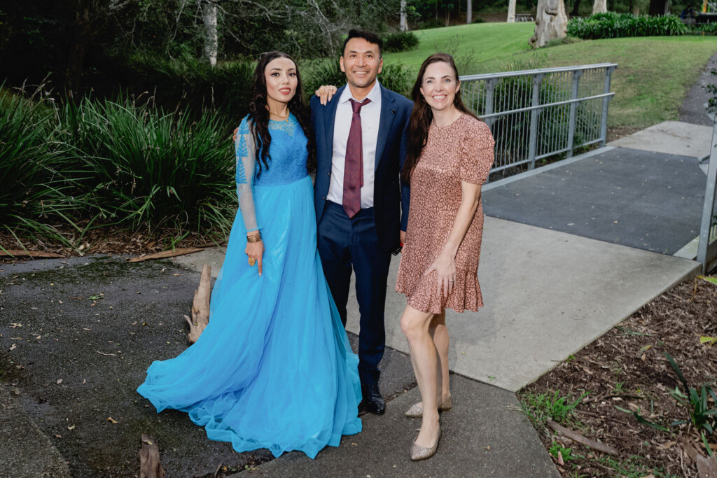 Celebrant Julie Muir stand with newlyweds at Jesmond Park wedding