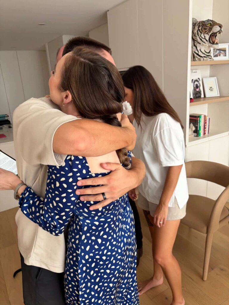 hamilton-wedding-groom-hugging-the-celebrant-julie muir