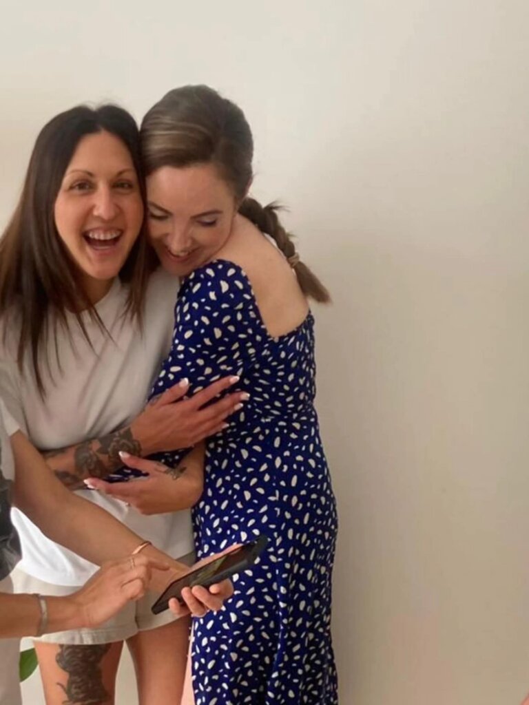 hamilton-wedding-celebrant-Julie Muir-hugging-the-bride