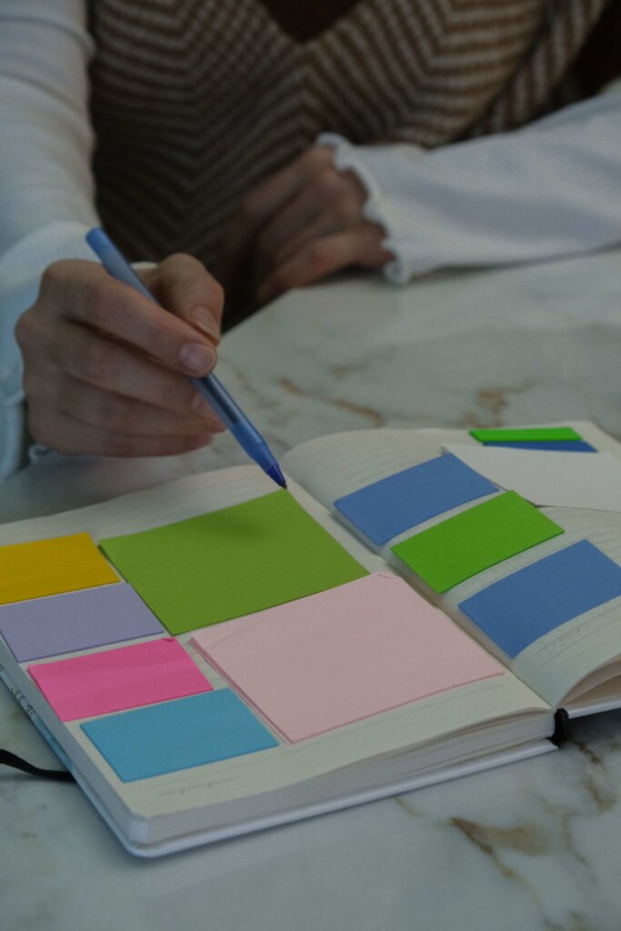 person-preparing-an-organised-notebook-for-admin-after-death