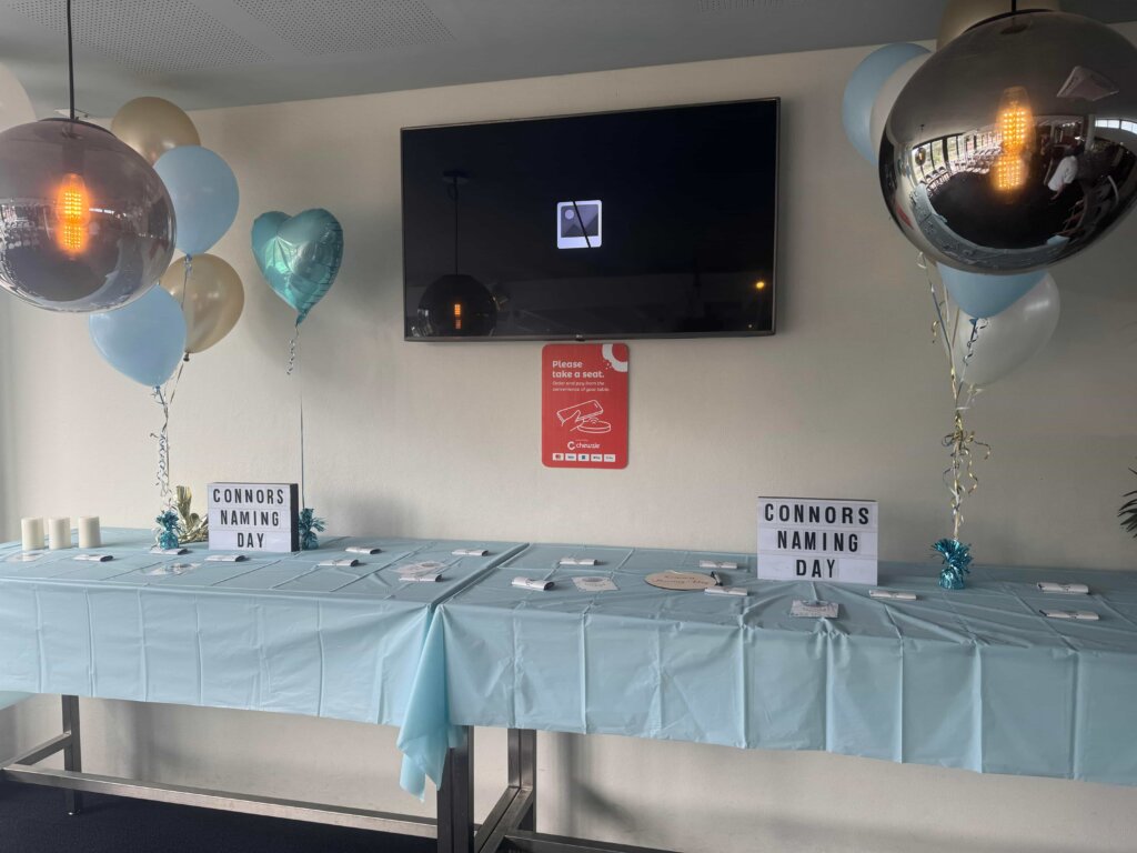 baby-naming-ceremony-simple-celebration-setup-at-shortland-for-connor