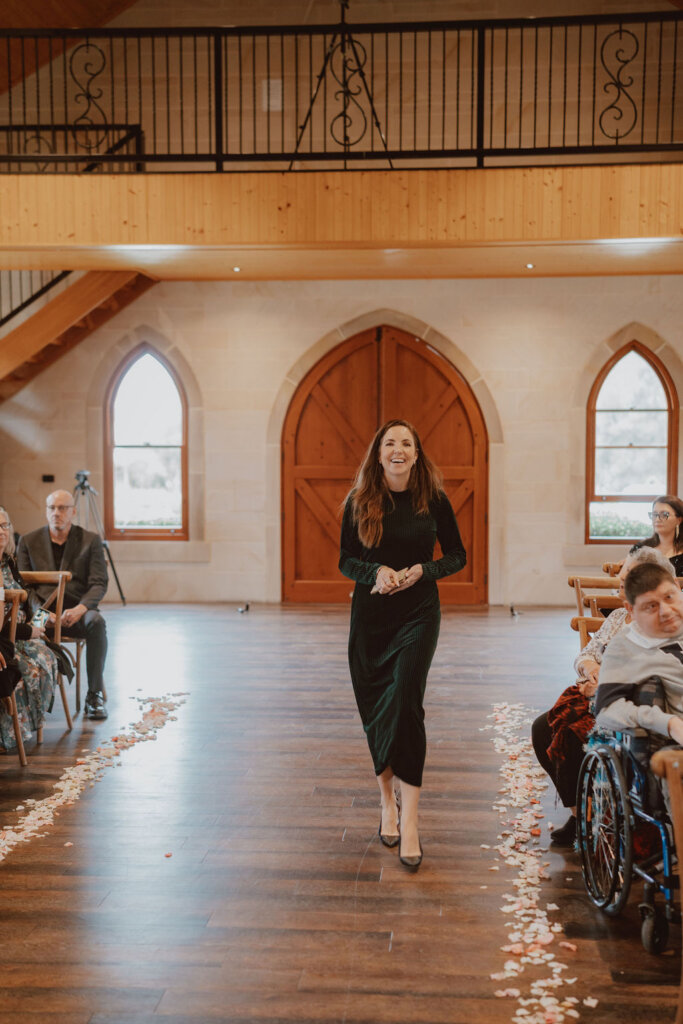 julie-muir-celebrant-walking-down-the-aisle-rachel-and-nick-wedding
