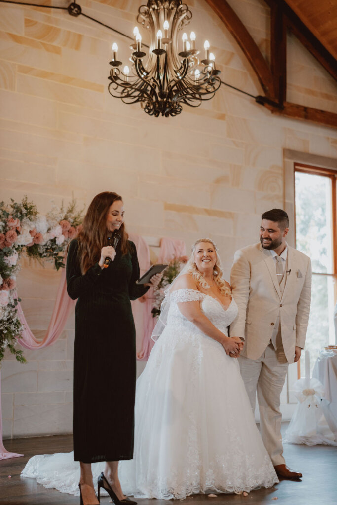 julie-muir-celebrant-with-bride-and-groom-during-ceremony-rachel-and-nick