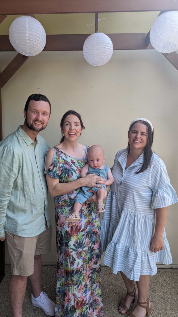 julie-muir-with-the-parents-during-a-baby-naming-ceremony